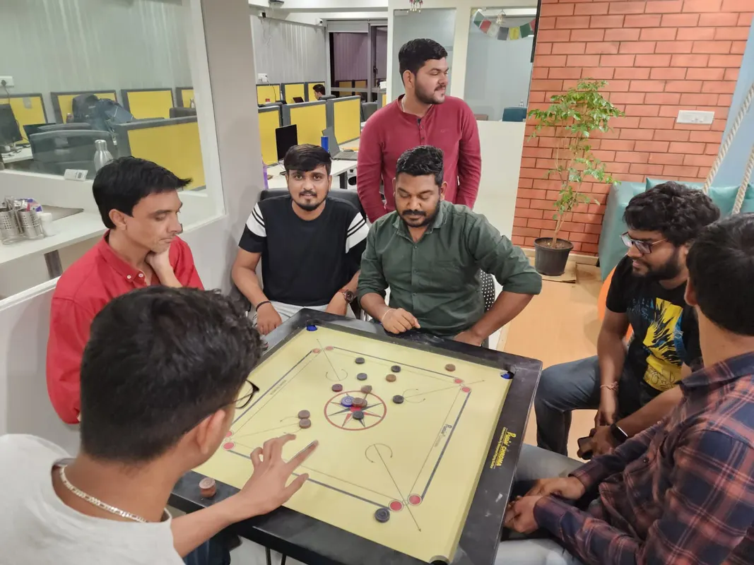 Playing carrom fun friday activities upforcetech